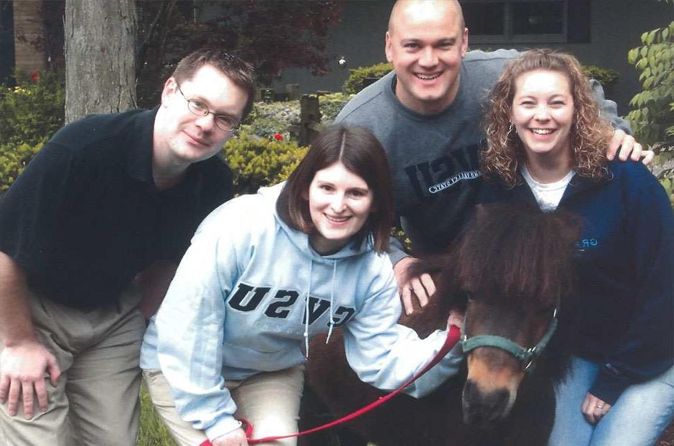 4 interns with mini horse